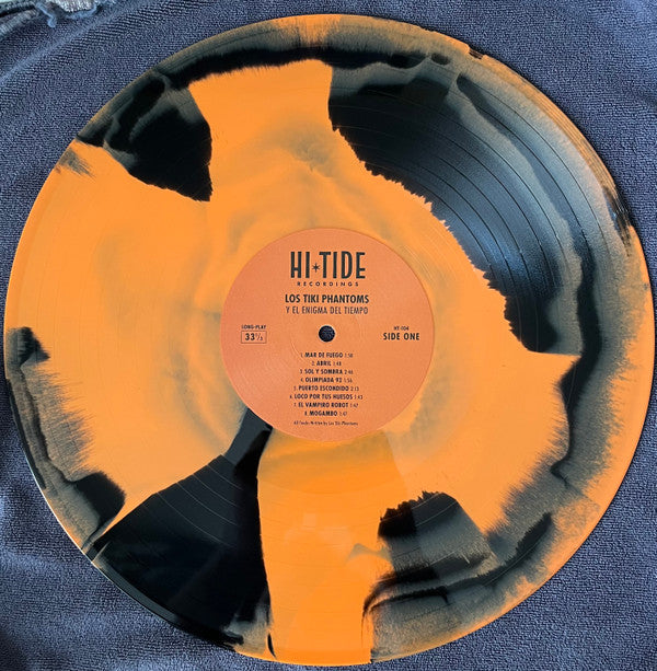 Los Tiki Phantoms : Y El Enigma Del Tiempo (LP, Album, Ltd, Ora)