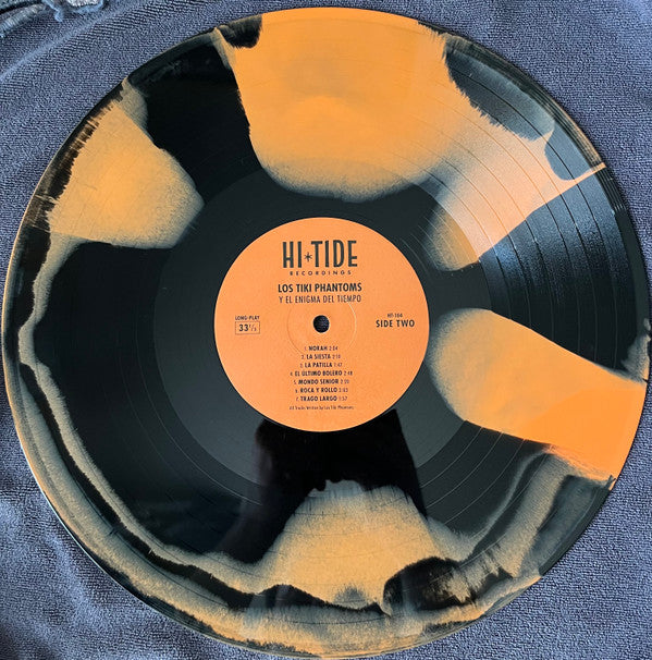 Los Tiki Phantoms : Y El Enigma Del Tiempo (LP, Album, Ltd, Ora)