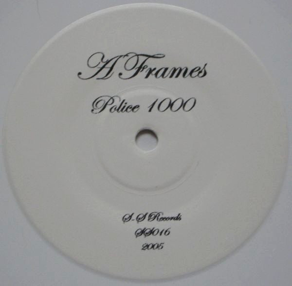 A Frames : Police 1000 / Traction (7", Whi)
